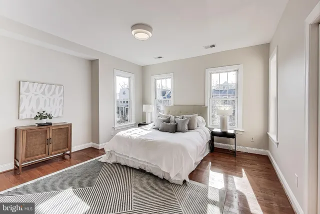 a bathroom with a tub and a shower