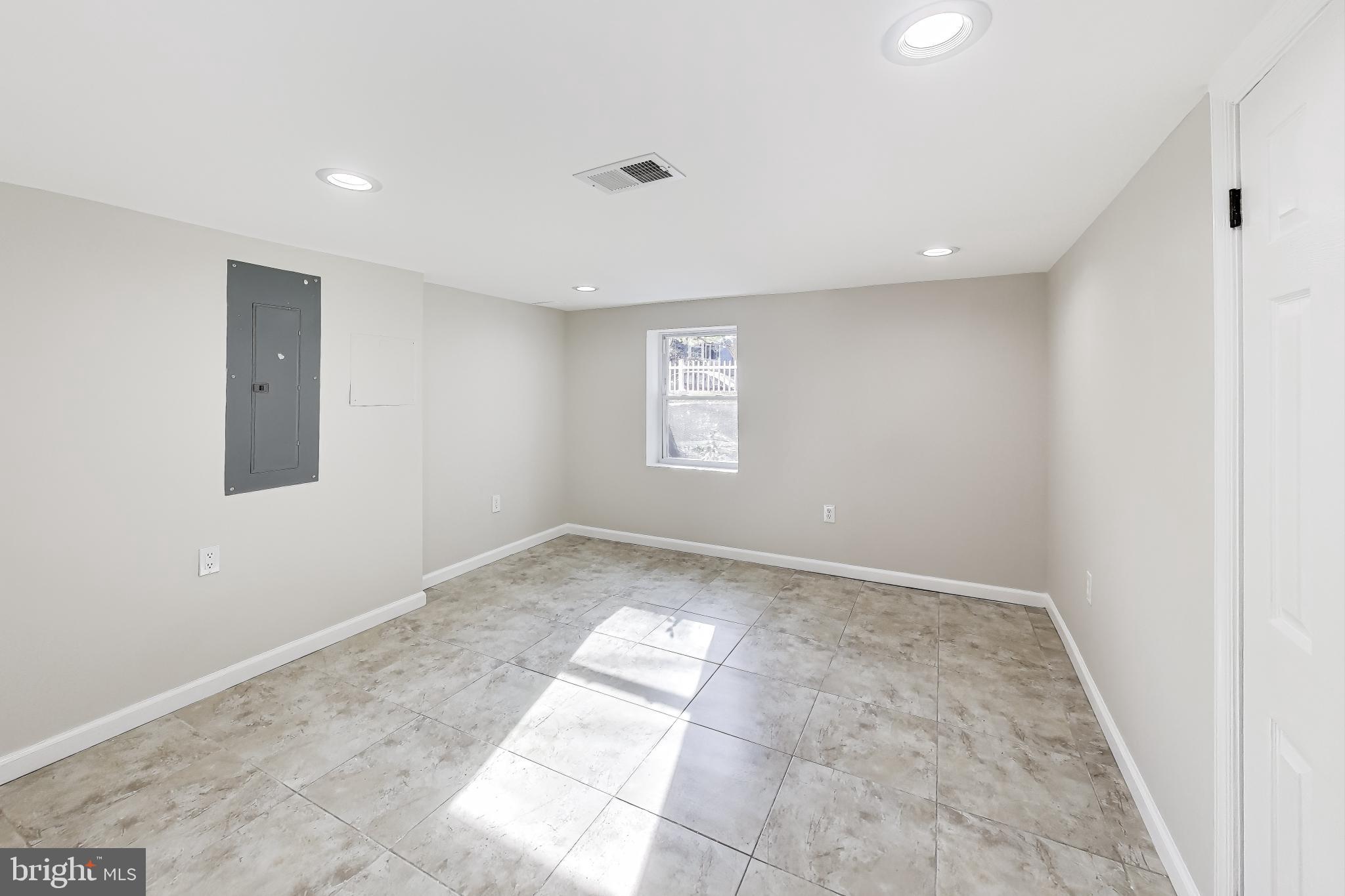 4301 Kansas Avenue Northwest Washington, DC 20011 - Photo 65 of 80 a view of an empty room and window
