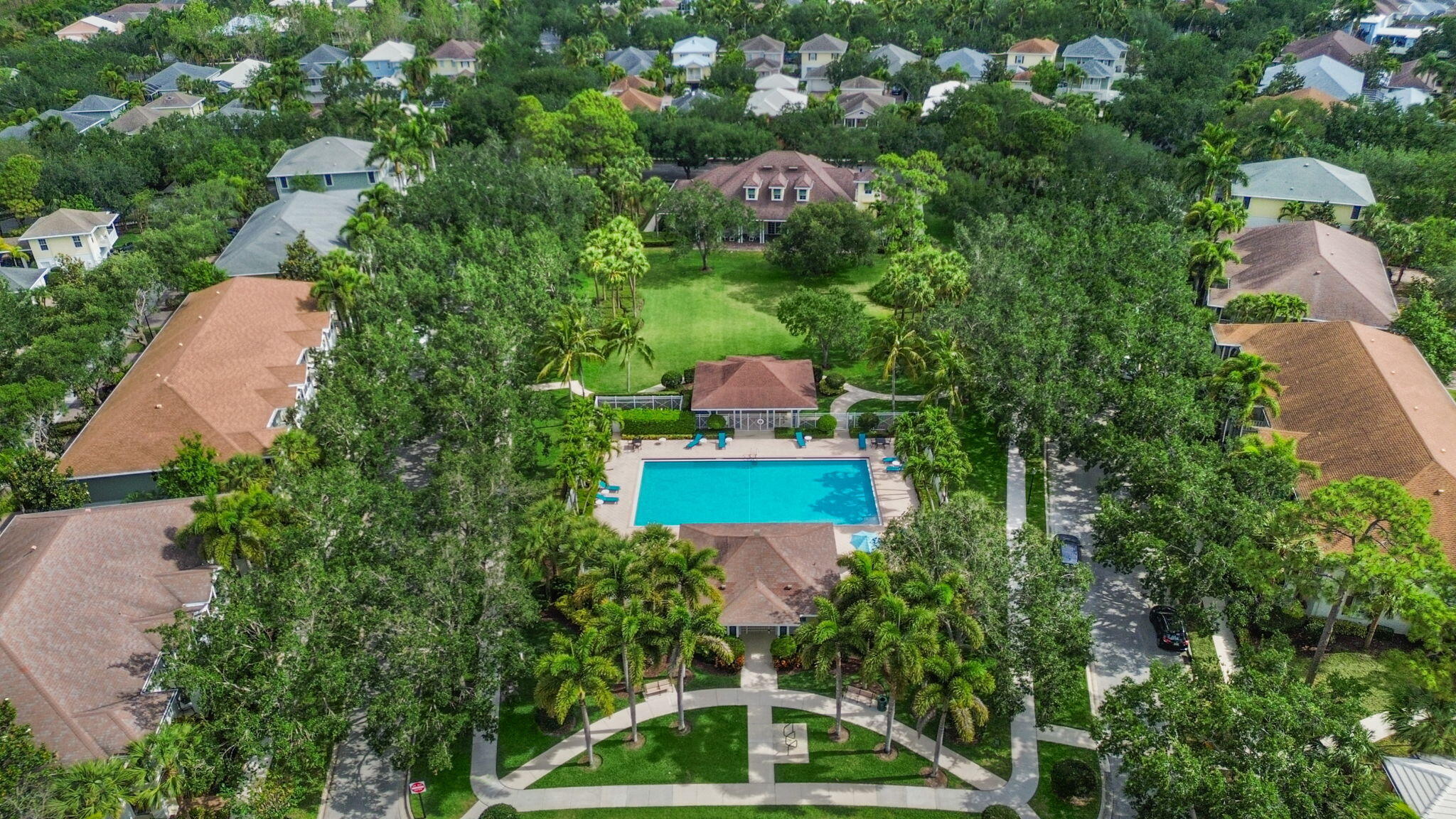 3119 East Community Drive Jupiter, FL 33458 - Photo 18 of 24 an aerial view of a house with a yard and lake view
