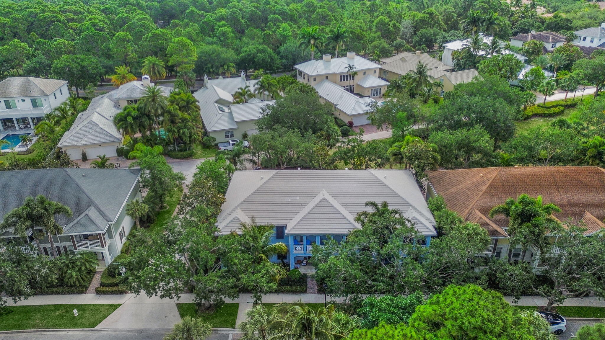 3119 East Community Drive Jupiter, FL 33458 - Photo 23 of 24 an aerial view of multiple houses with yard