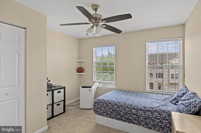 a view of an empty room with a fireplace