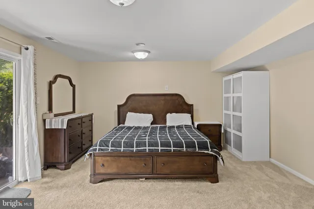 a view of a patio with a yard