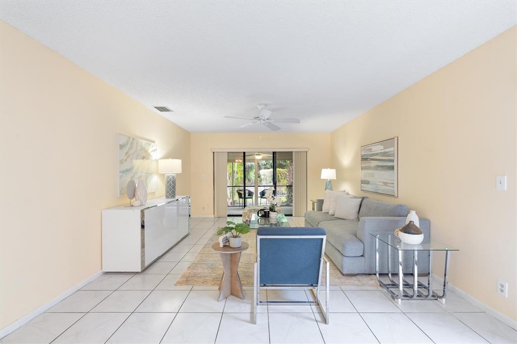 4342 Acacia Circle Coconut Creek, FL 33066 - Photo 17 of 20 a living room with furniture