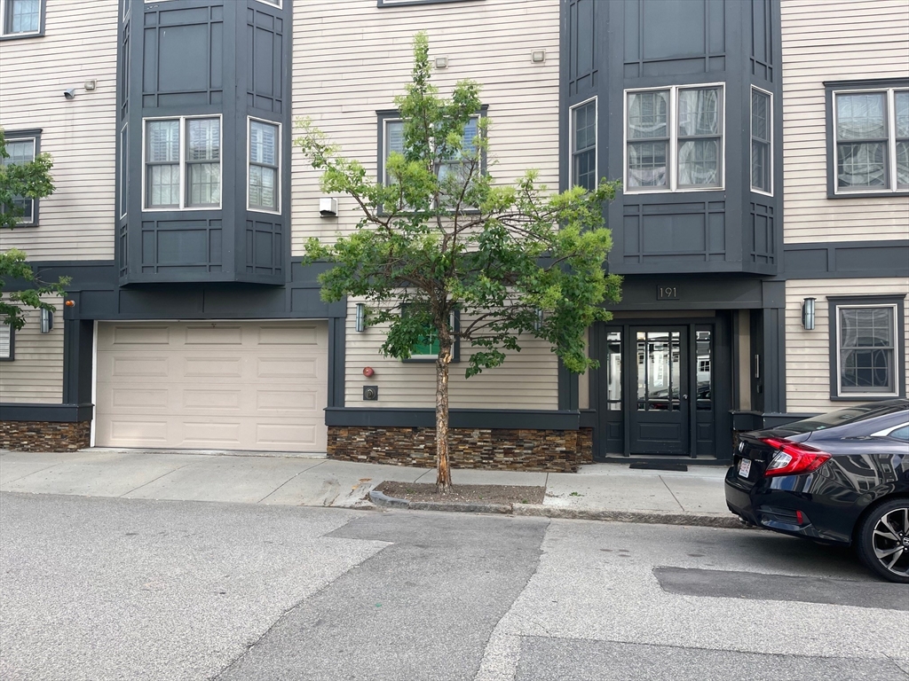 a car parked in front of a house