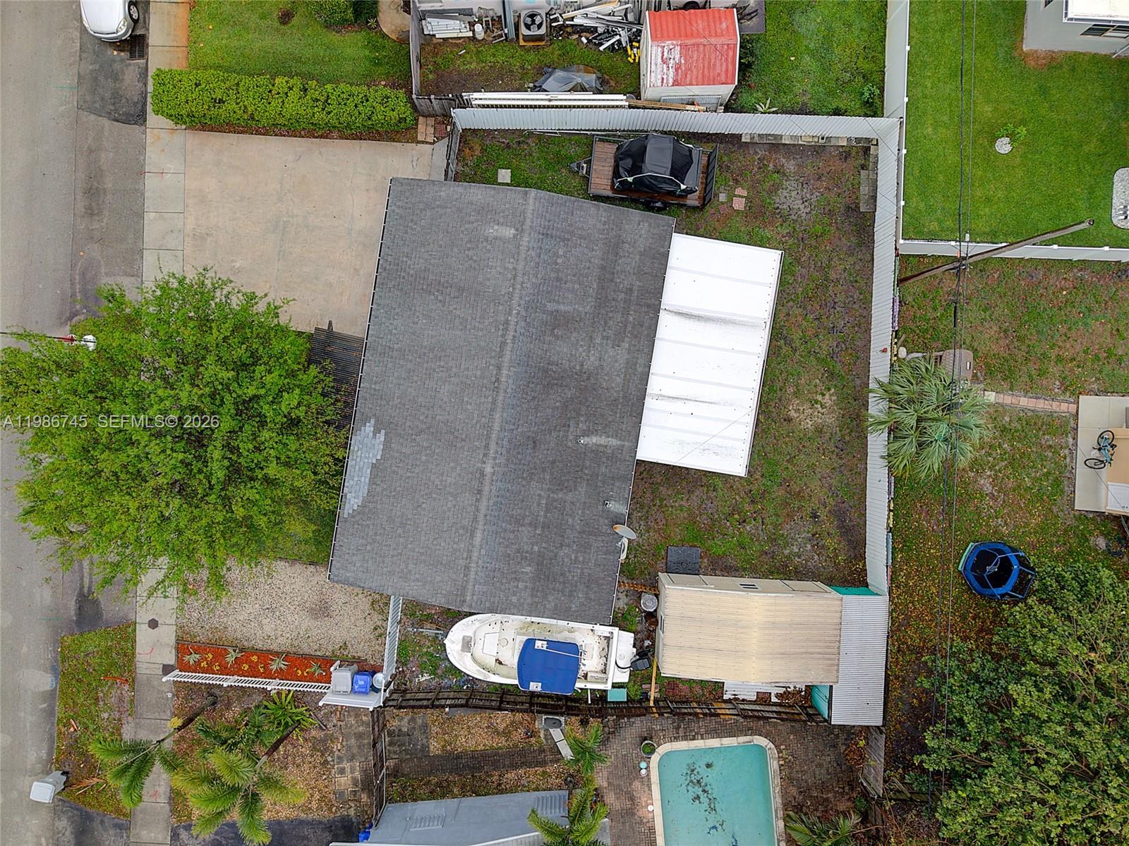 2810 Northeast 11th Terrace Pompano Beach, FL 33064 - Photo 28 of 33 an aerial view of a house with a yard