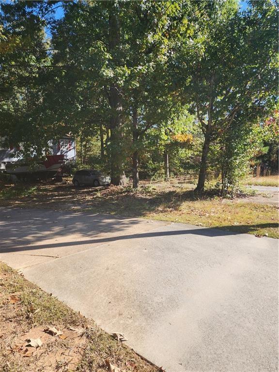 4336 Central Church Road Douglasville, GA 30135 - Photo 2 of 8 a view of a yard with a trees
