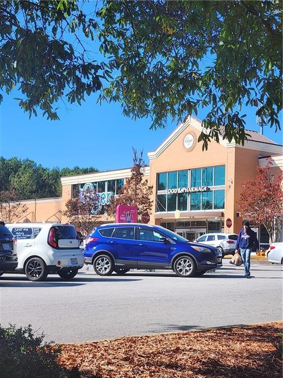 4336 Central Church Road Douglasville, GA 30135 - Photo 5 of 8 a car parked in front of a house