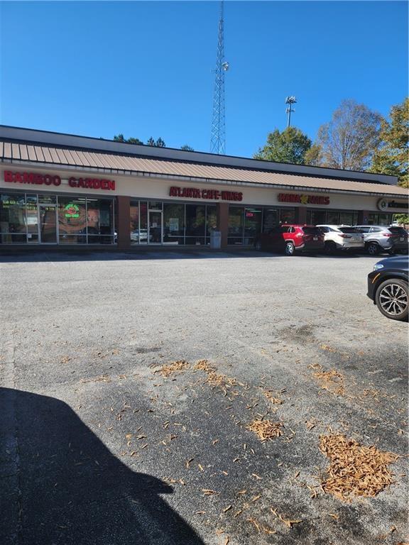 4336 Central Church Road Douglasville, GA 30135 - Photo 7 of 8 a front view of a house with a yard
