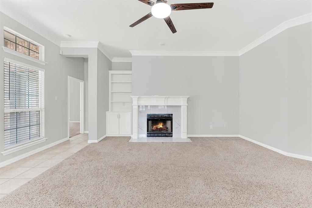 3500 Neiman Road Plano, TX 75025 - Photo 11 of 26 You'll be set when cooler weather arrive with this fireplace including a gas starter and the built-in bookcase to the side. Another super-sized room just waiting for you to fill it with family, friends, and laughter!