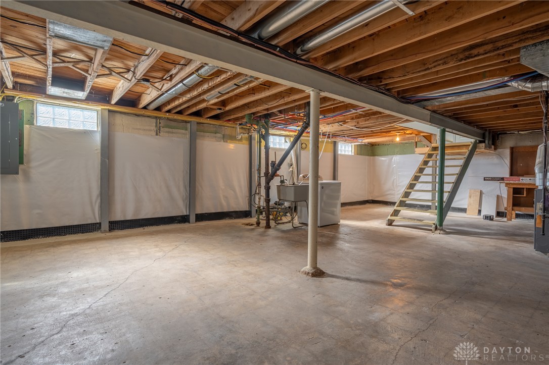 326 North Bromfield Road Kettering, OH 45429 - Photo 22 of 30 This spacious unfinished basement offers endless possibilities for customization and expansion.