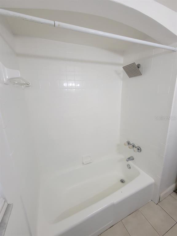7922 Kelpie Drive Port Richey, FL 34668 - Photo 18 of 24 a bathroom with a bathtub