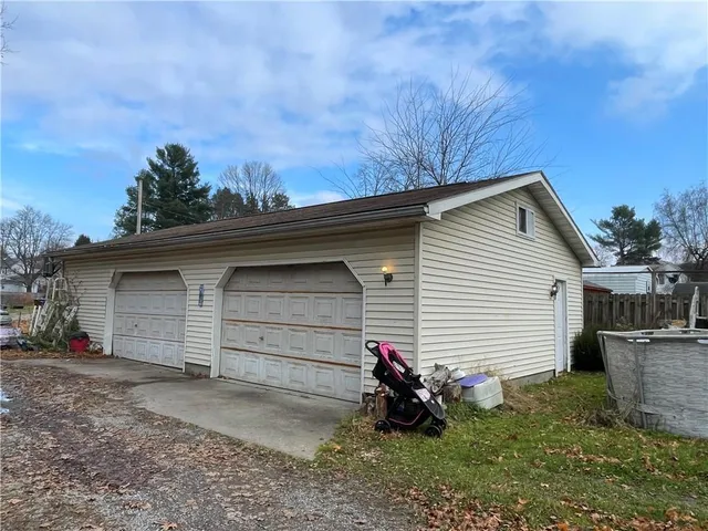 a view of backyard and house
