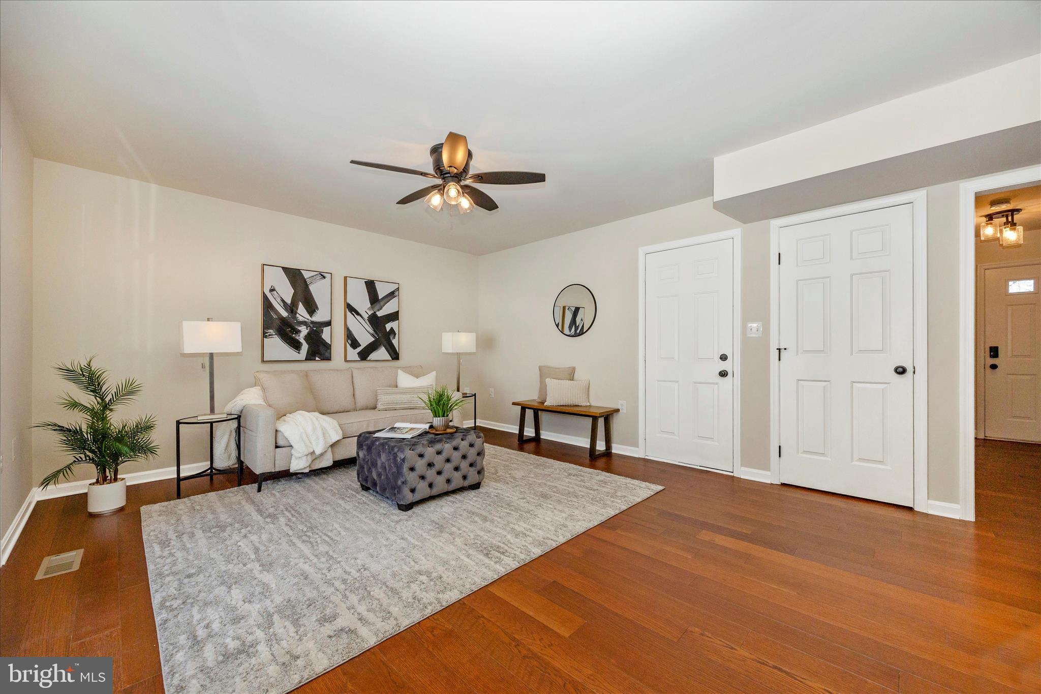 6630 Fox Meade Court Frederick, MD 21702 - Photo 27 of 84 a living room with furniture and wooden floor