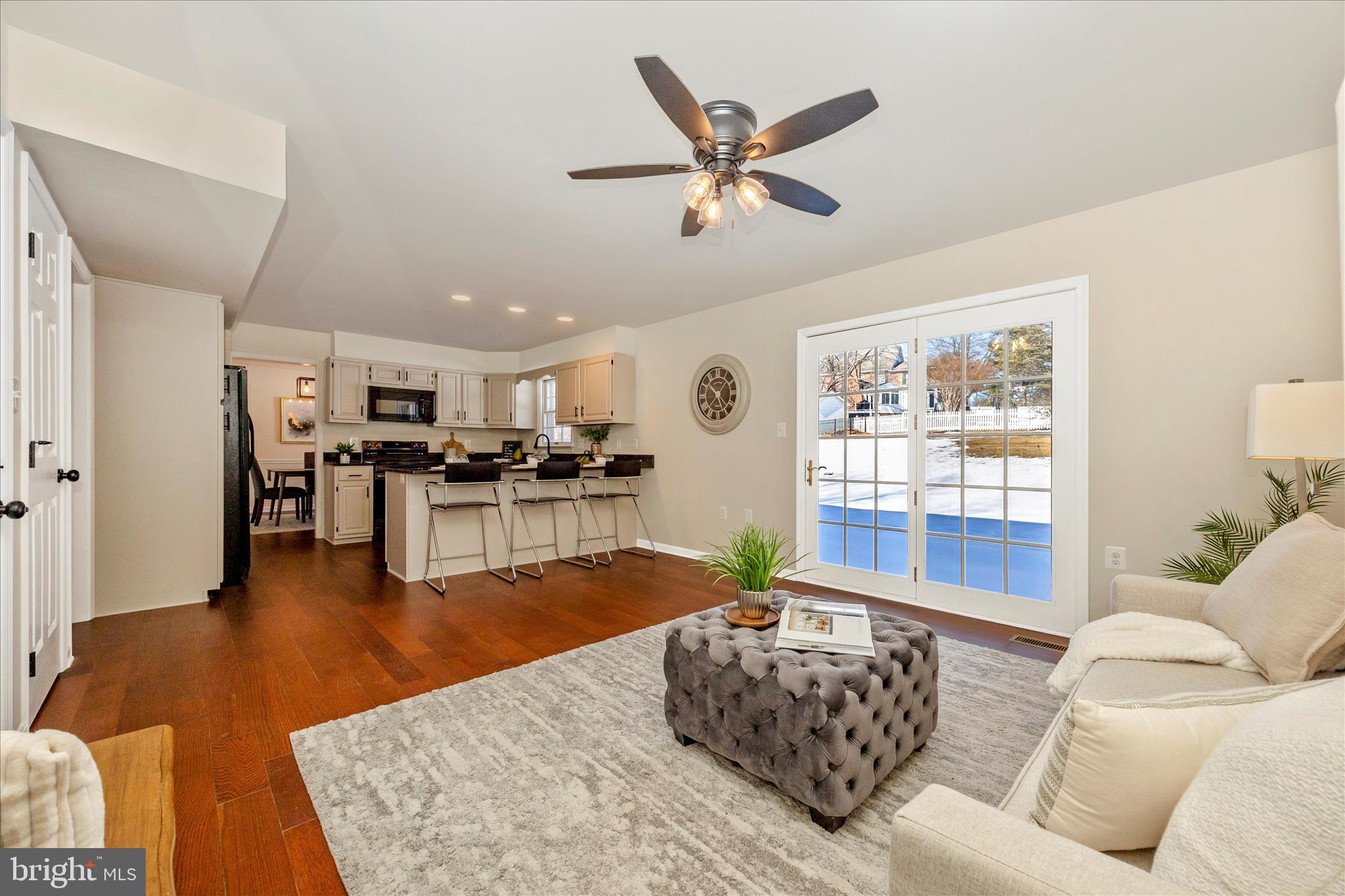 6630 Fox Meade Court Frederick, MD 21702 - Photo 28 of 84 a living room with furniture and kitchen view