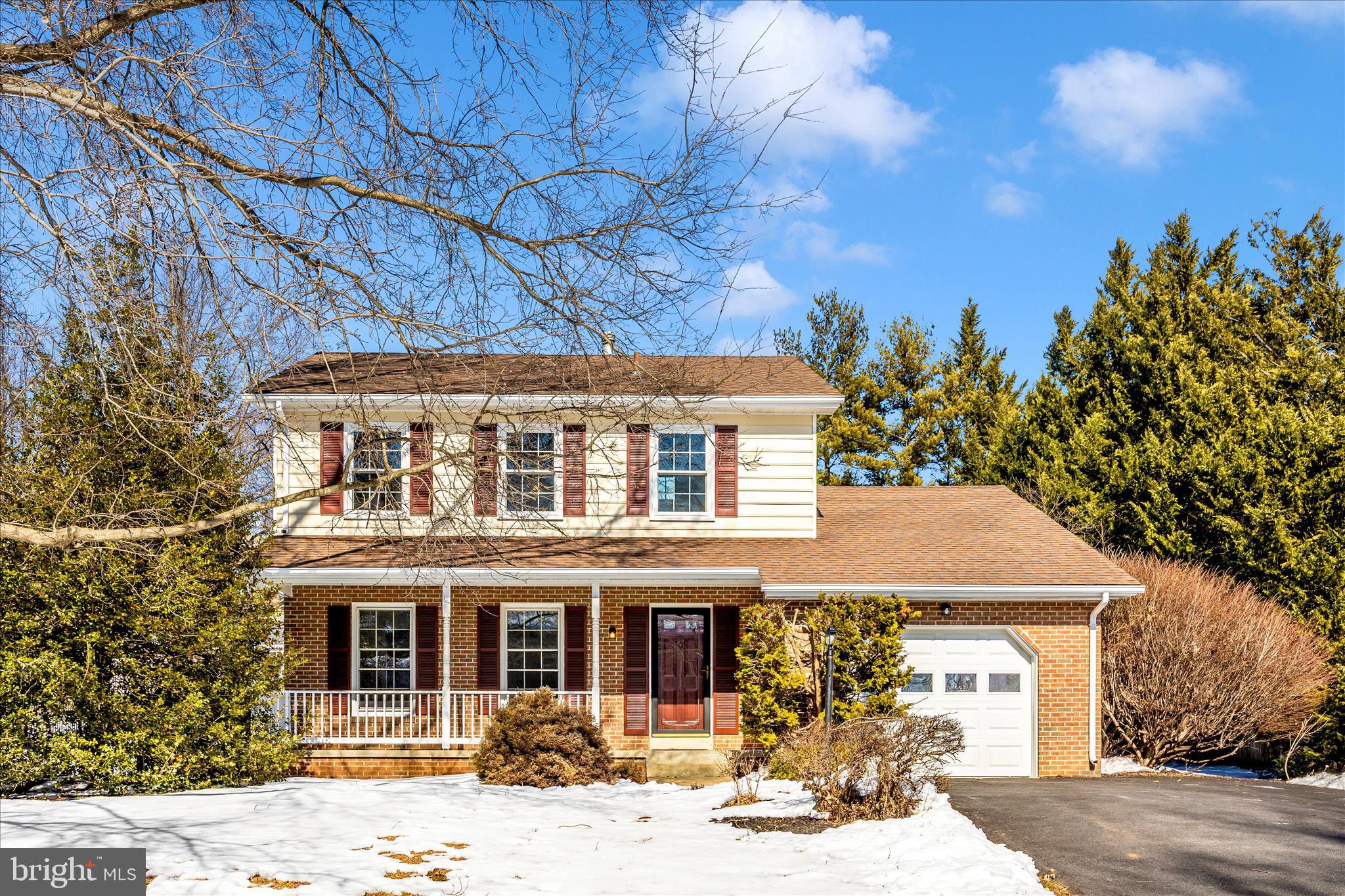 6630 Fox Meade Court Frederick, MD 21702 - Photo 5 of 84 front view of a house with a view of a building