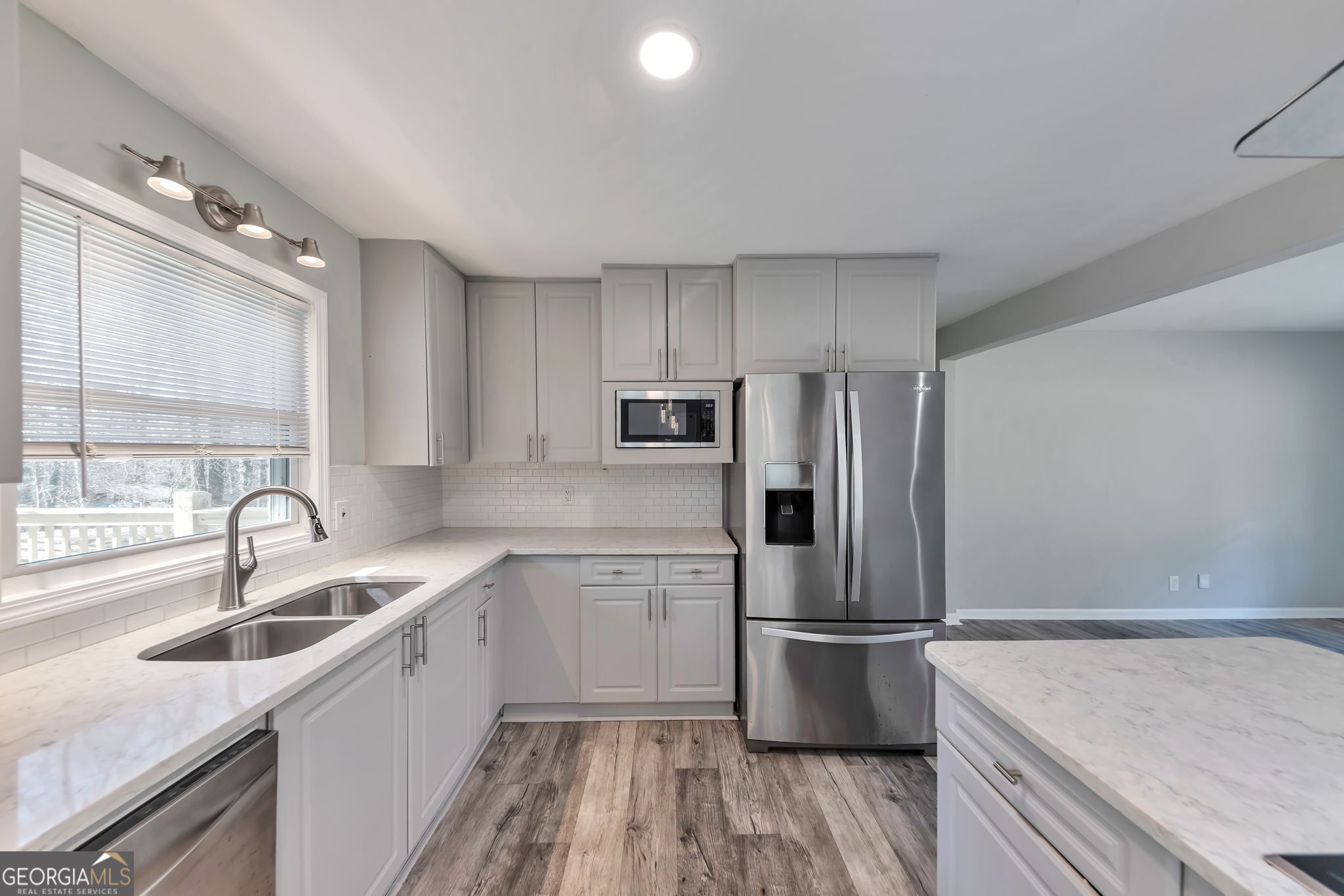 2764 Veltre Place Southwest Atlanta, GA 30311 - Photo 13 of 30 a kitchen with a sink appliances and cabinets