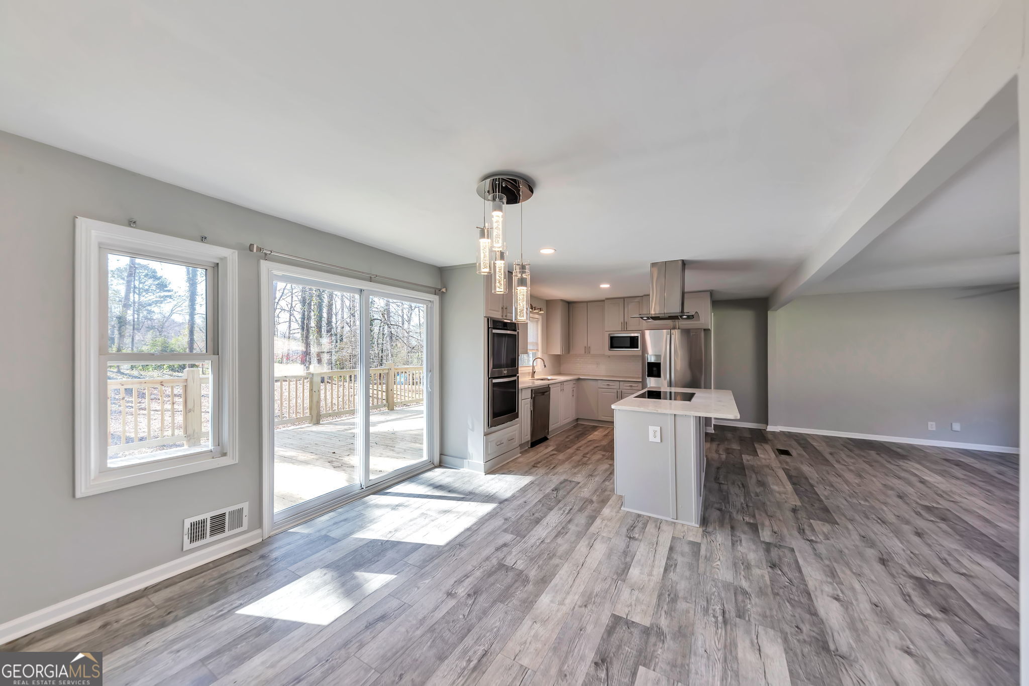 2764 Veltre Place Southwest Atlanta, GA 30311 - Photo 16 of 30 a kitchen with a wooden floor and window