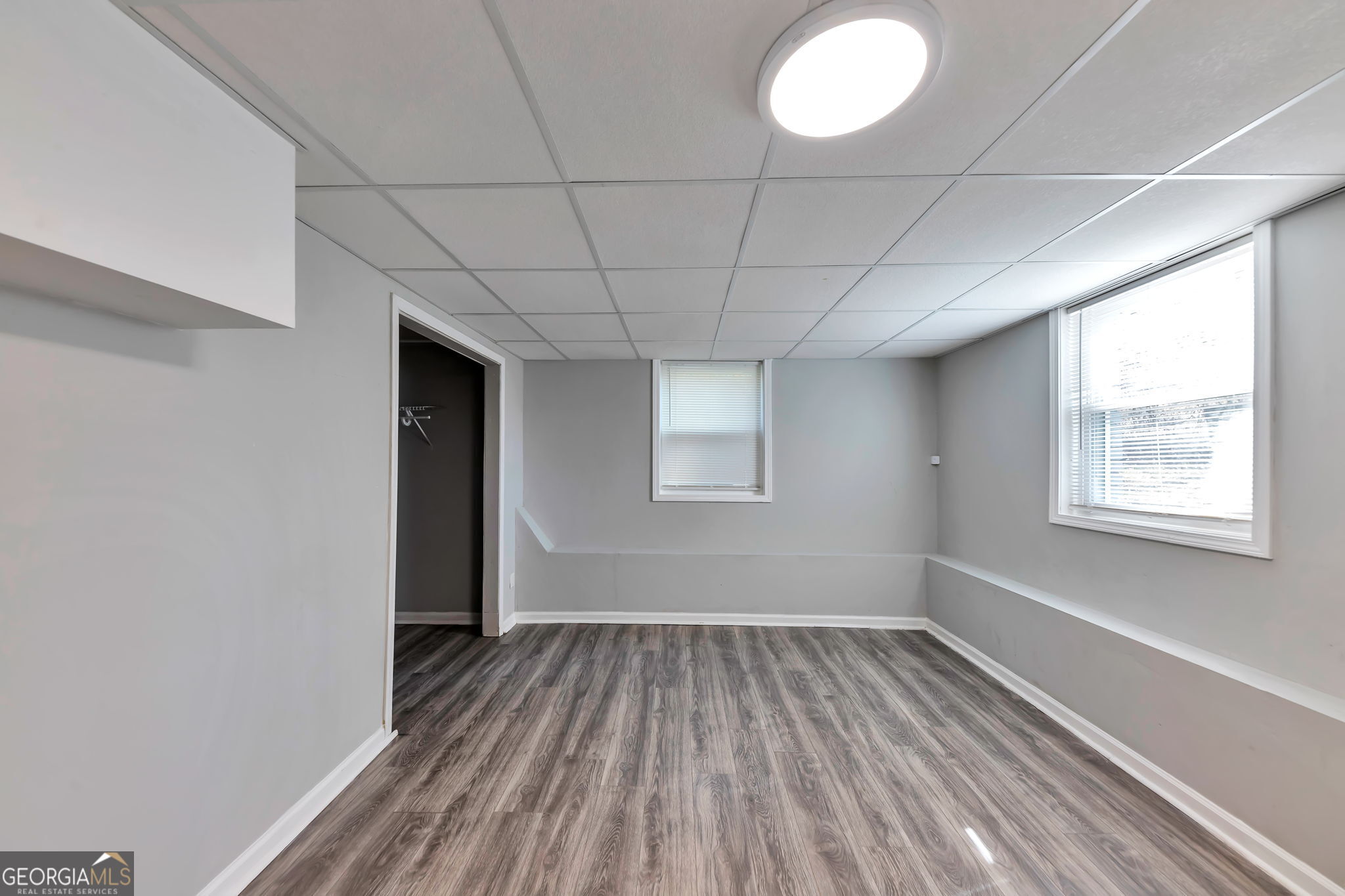 2764 Veltre Place Southwest Atlanta, GA 30311 - Photo 28 of 30 a view of a room with wooden floor and windows