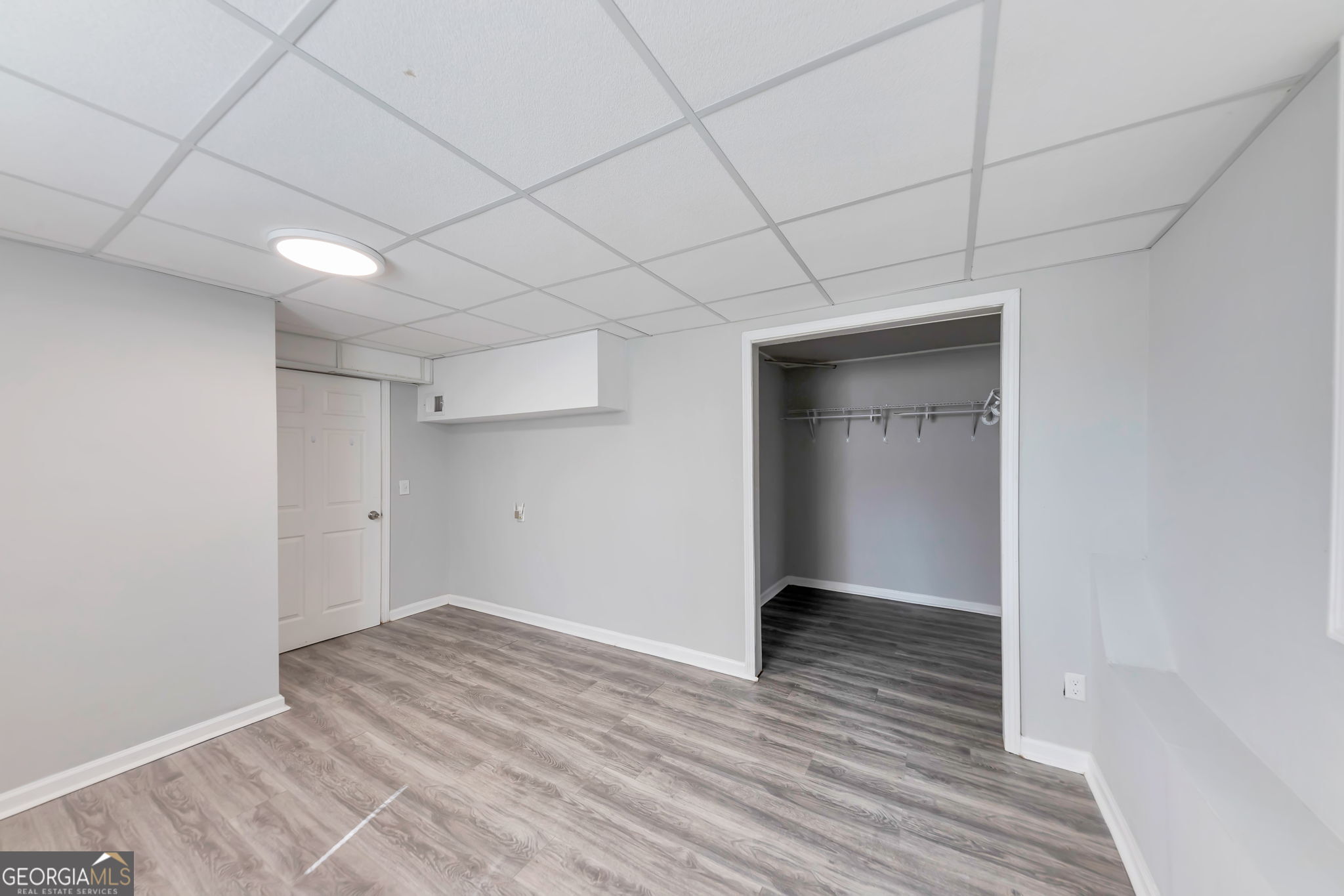 2764 Veltre Place Southwest Atlanta, GA 30311 - Photo 29 of 30 a view of an empty room with wooden floor