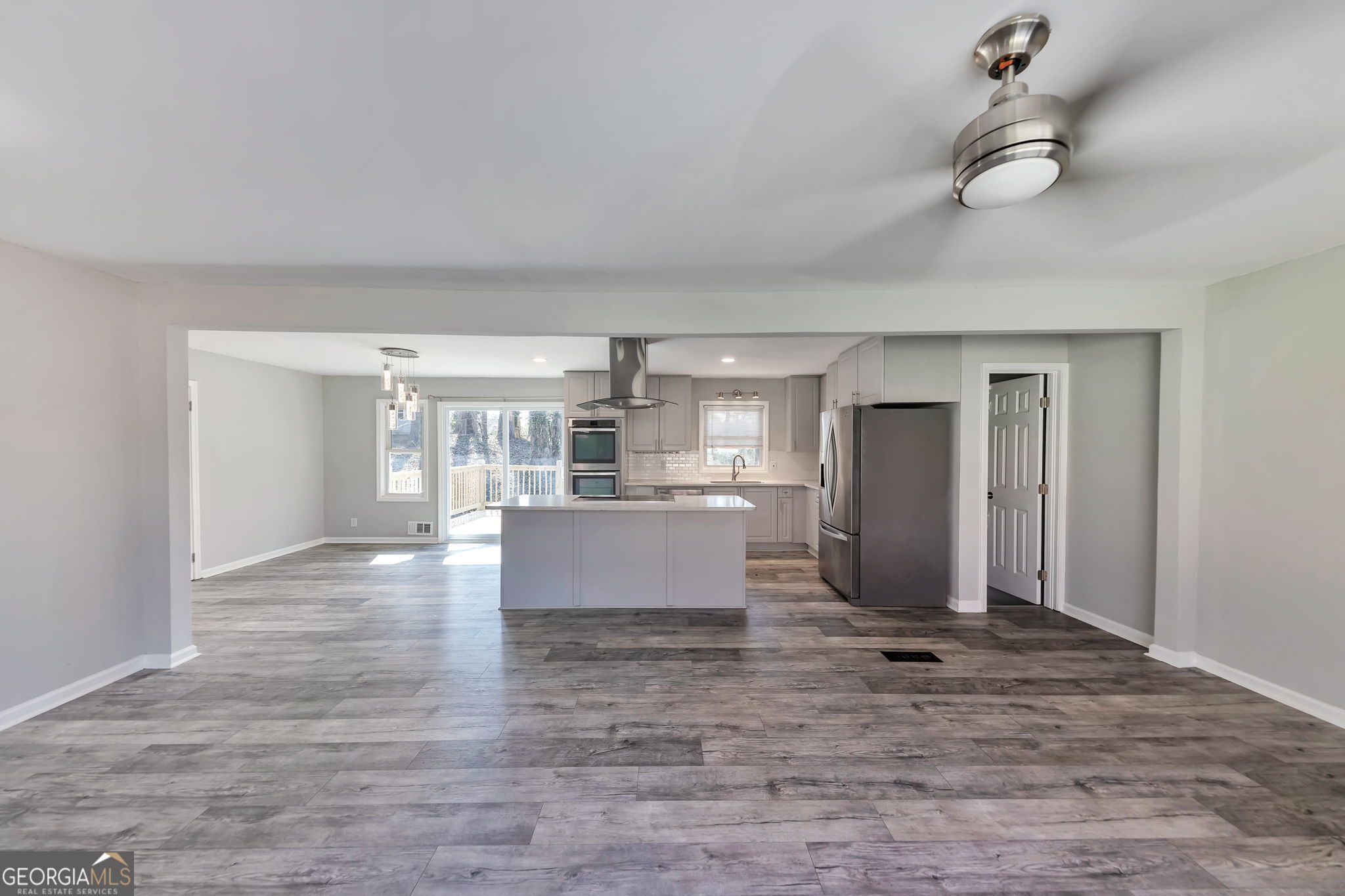 2764 Veltre Place Southwest Atlanta, GA 30311 - Photo 10 of 30 a view of kitchen and hall with wooden floor