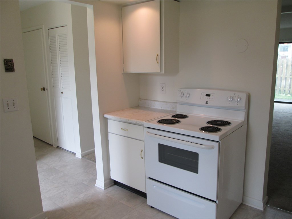 553 French Road Brighton, NY 14618 - Photo 3 of 33
Bright kitchen with white appliancea and new dish