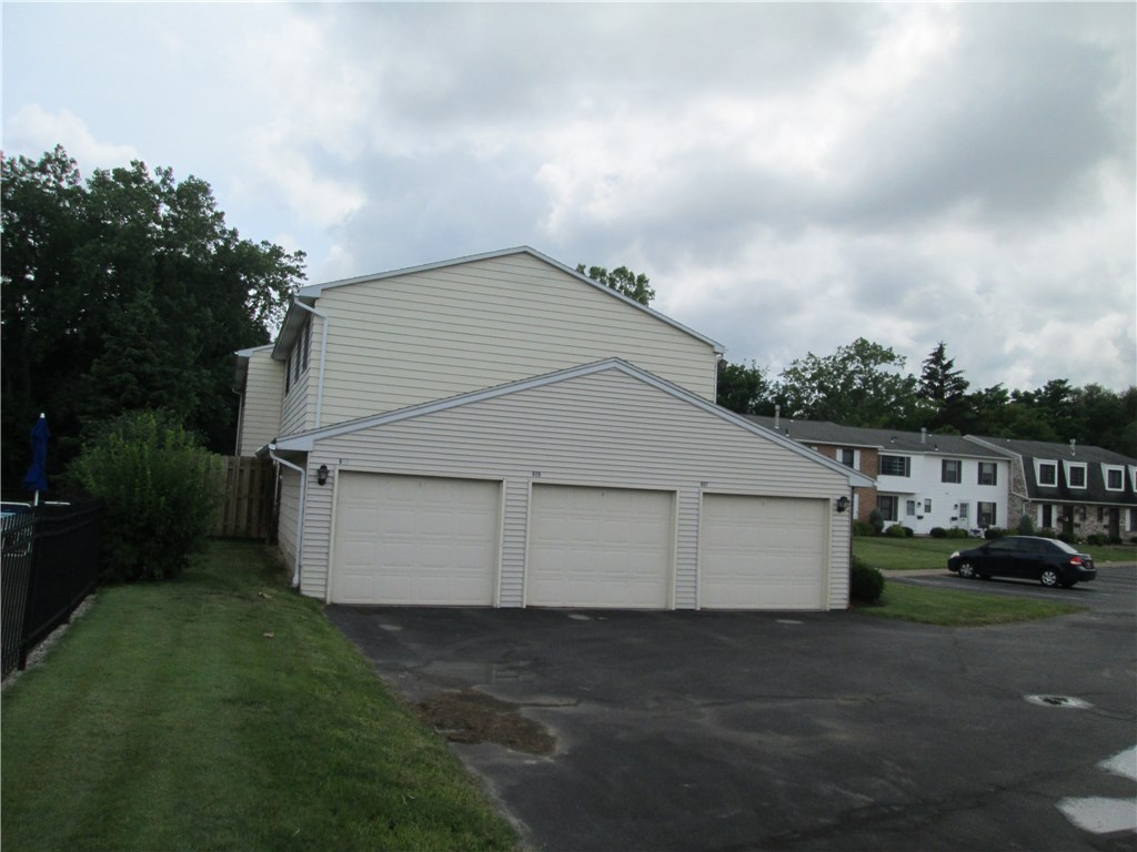 553 French Road Brighton, NY 14618 - Photo 32 of 33
One car detached garage with opener.