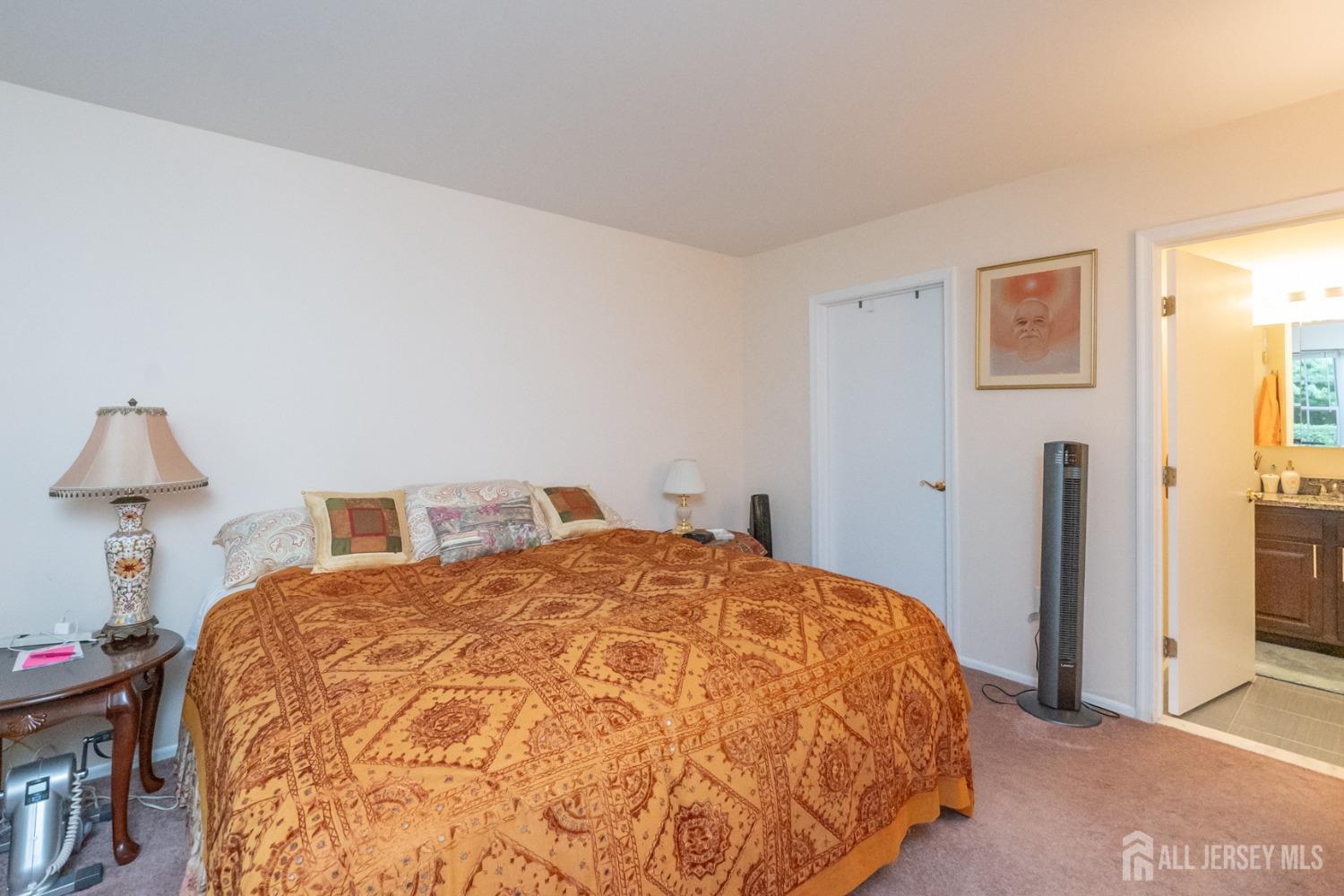 1405 Plymouth Road North Brunswick, NJ 08902 - Photo 17 of 32 a bedroom with a bed and a window