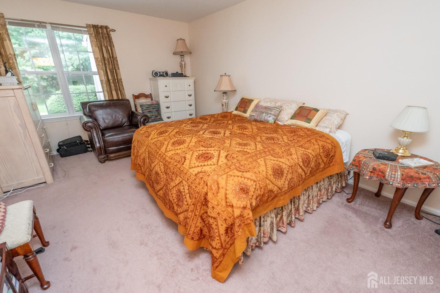 1405 Plymouth Road North Brunswick, NJ 08902 - Photo 18 of 32 a bedroom with a bed and a window