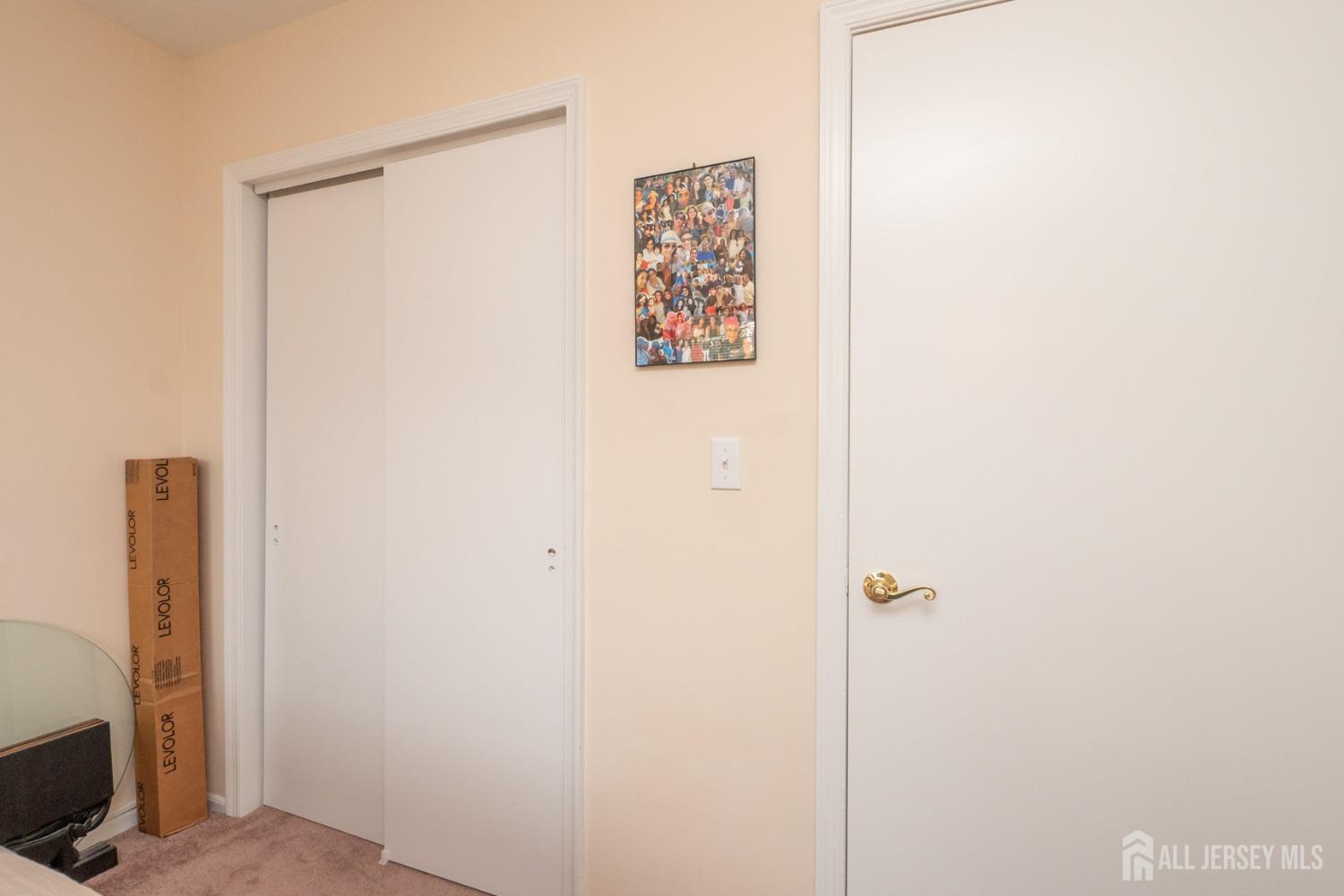 1405 Plymouth Road North Brunswick, NJ 08902 - Photo 23 of 32 a bathroom with a shower and a door