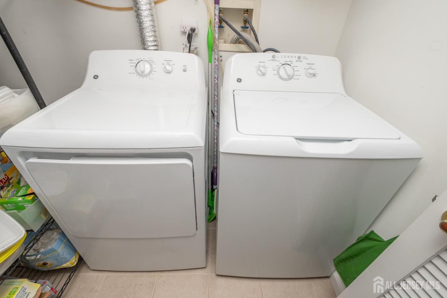 1405 Plymouth Road North Brunswick, NJ 08902 - Photo 25 of 32 a utility room with dryer and washer