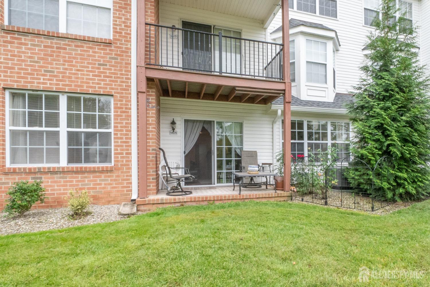 1405 Plymouth Road North Brunswick, NJ 08902 - Photo 27 of 32 a front view of a house with a yard