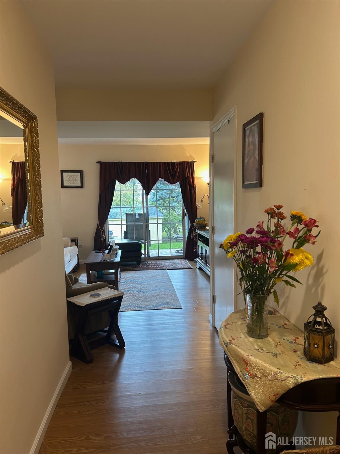 1405 Plymouth Road North Brunswick, NJ 08902 - Photo 4 of 32 a living room with furniture and a wooden floor