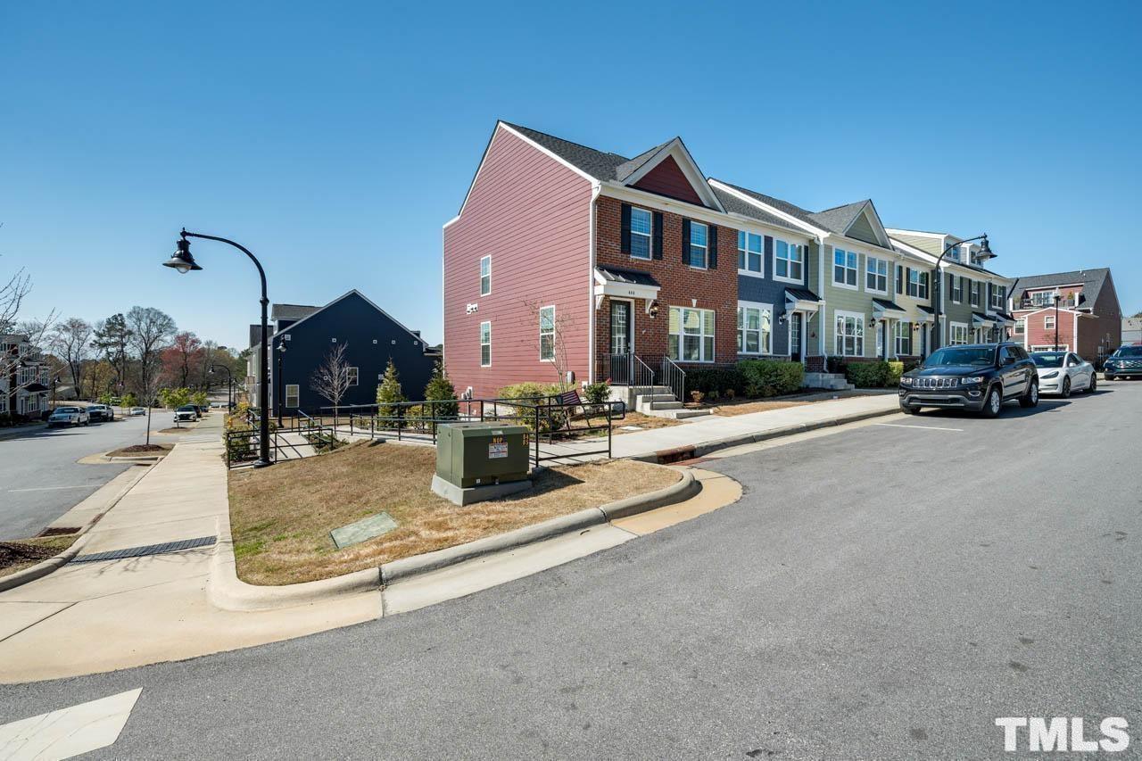 444 Rally Point Place Wake Forest, NC 27587 - Photo 3 of 38 a view of a street with cars