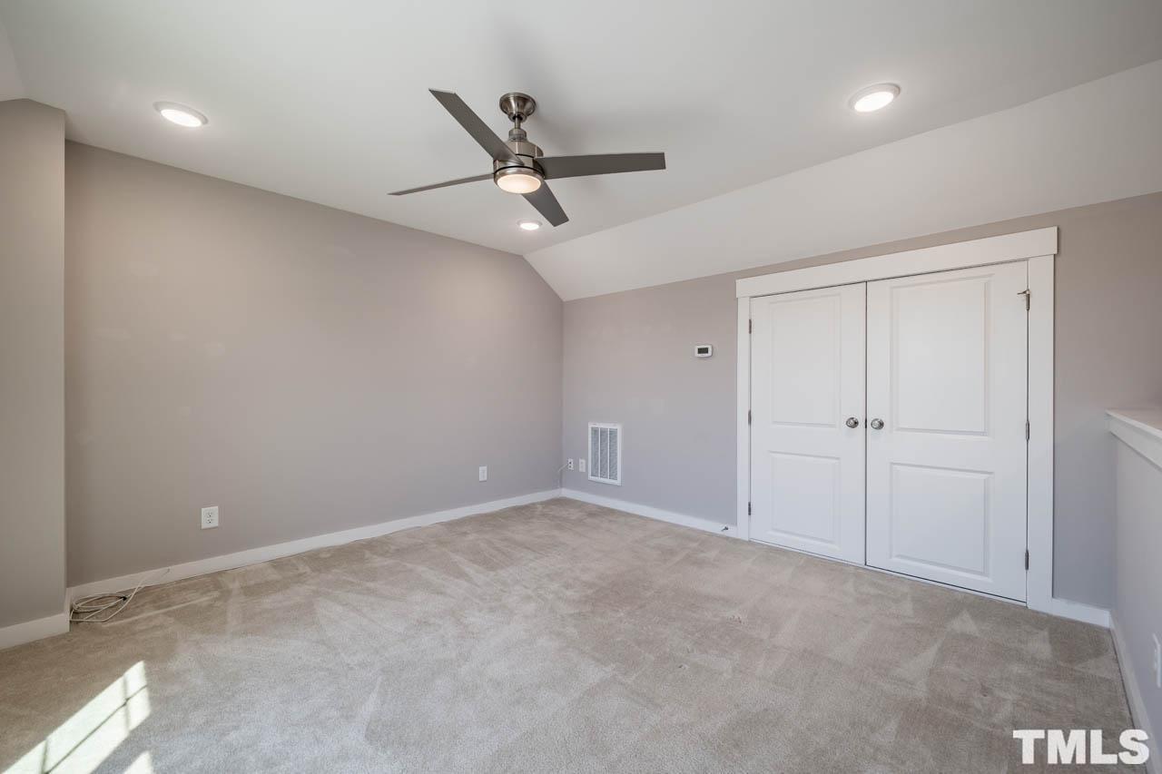444 Rally Point Place Wake Forest, NC 27587 - Photo 36 of 38 a view of an empty room
