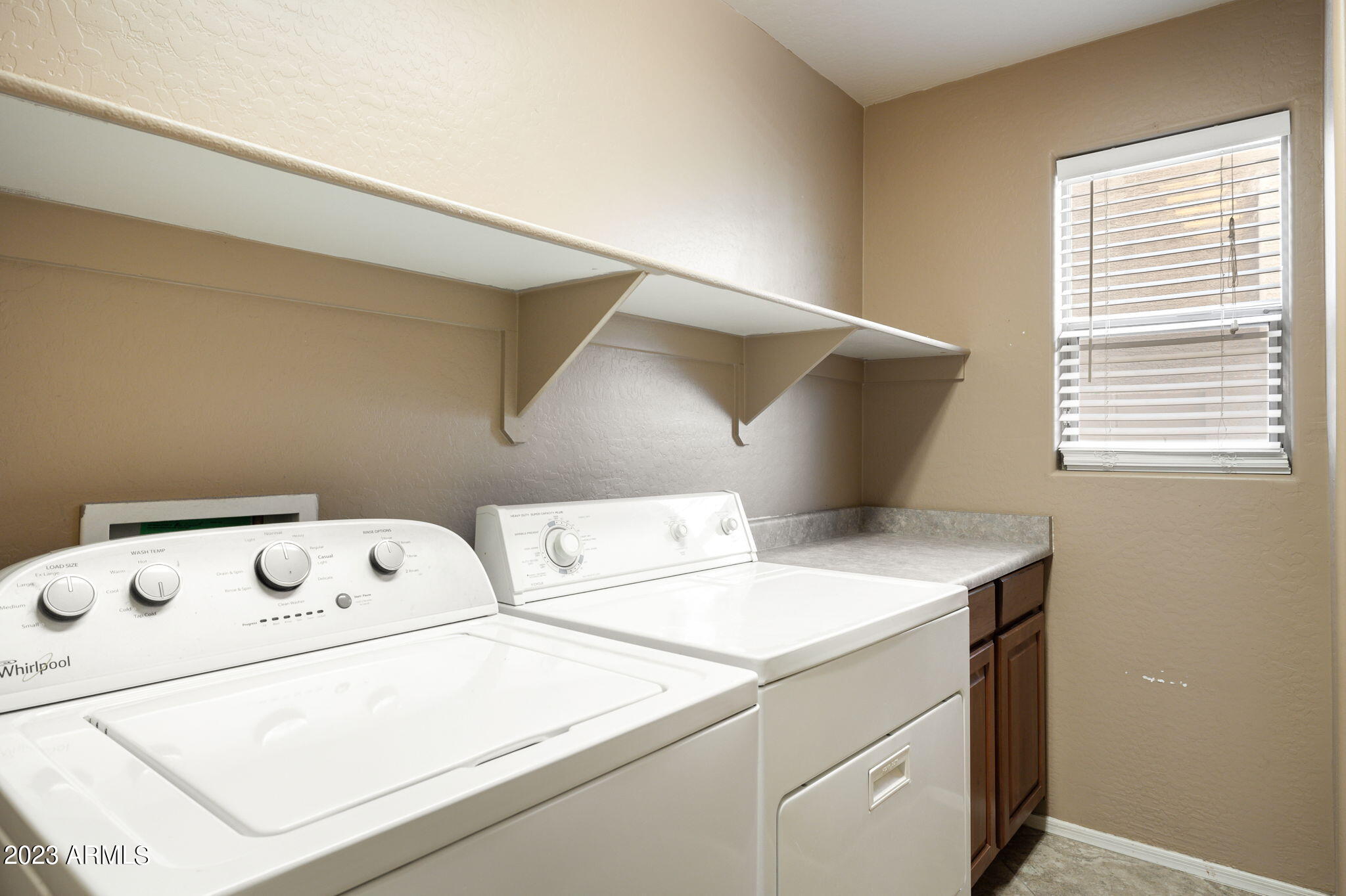 3344 West Montello Road Phoenix, AZ 85086 - Photo 31 of 38 a utility room with dryer and washer