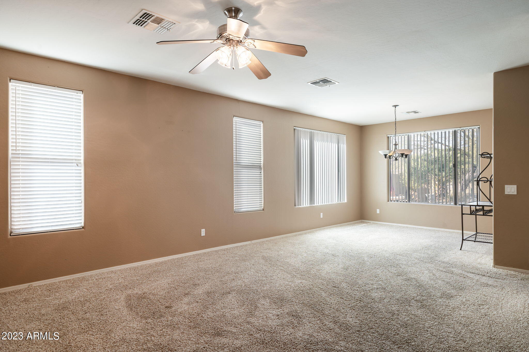 3344 West Montello Road Phoenix, AZ 85086 - Photo 8 of 38 a view of an empty room with a window
