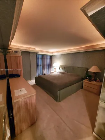 a view of a hallway with washer and dryer