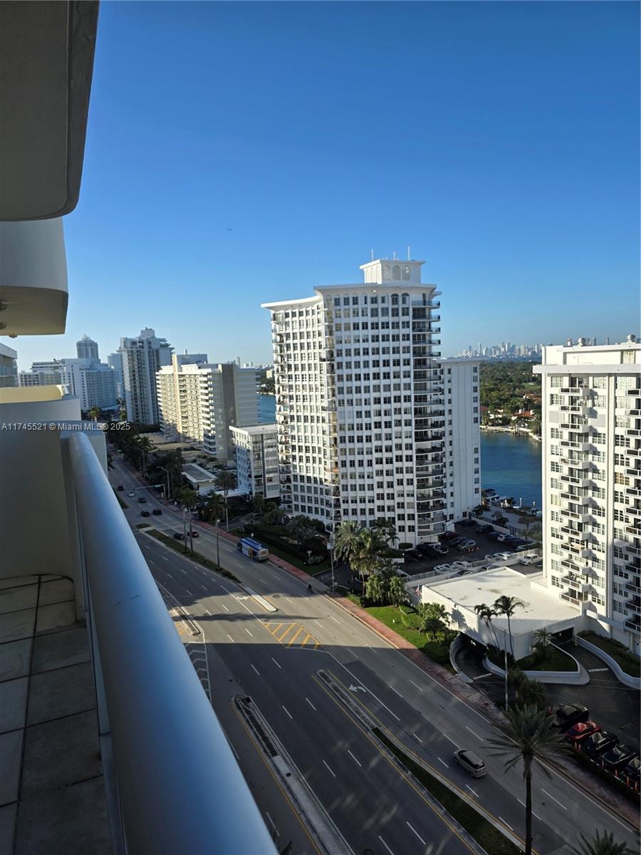 5757 Collins Avenue, Unit 1902 Miami Beach, FL 33140 - Photo 2 of 25 a view of a balcony with yard