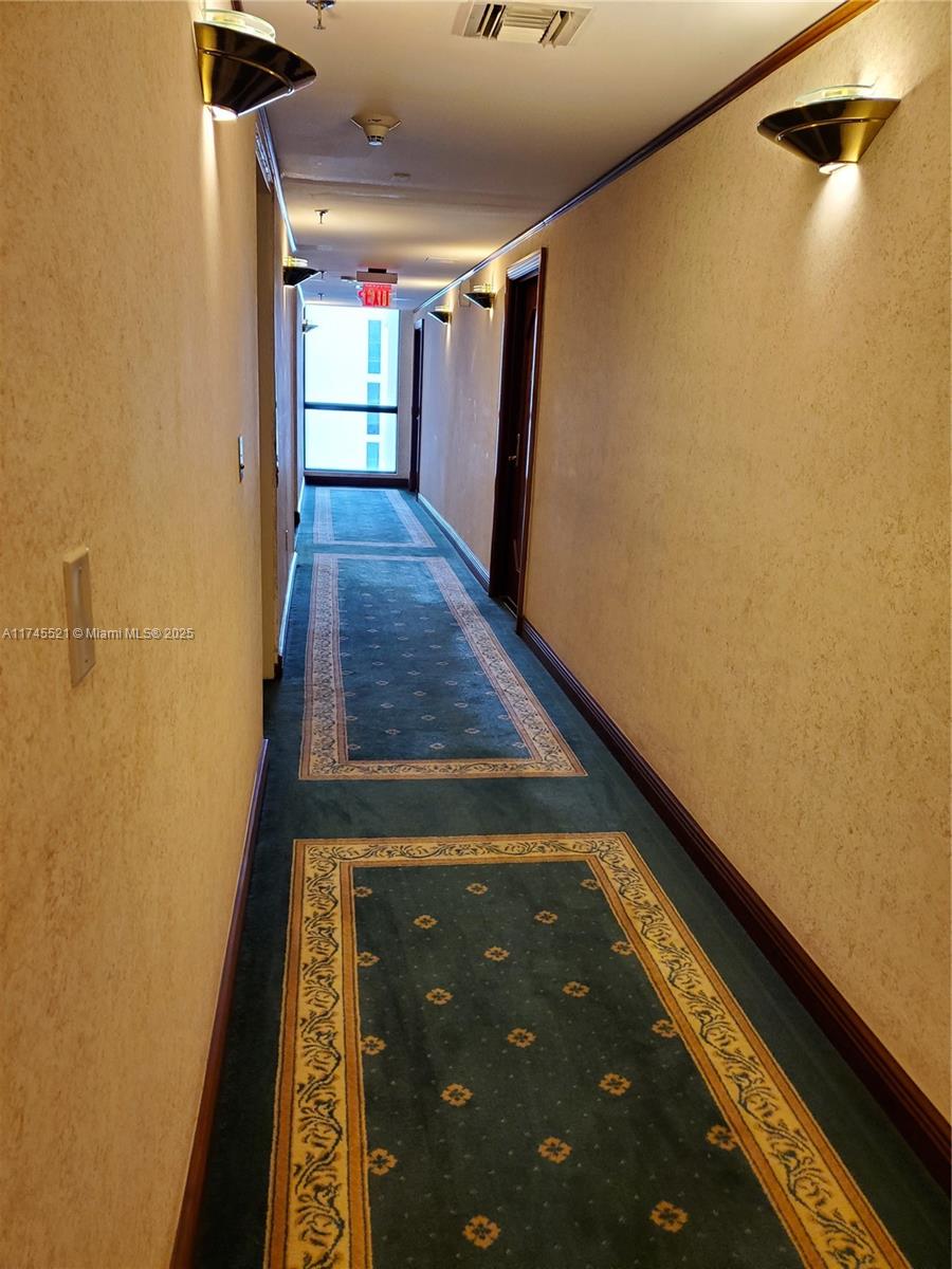 5757 Collins Avenue, Unit 1902 Miami Beach, FL 33140 - Photo 24 of 25 a view of entryway