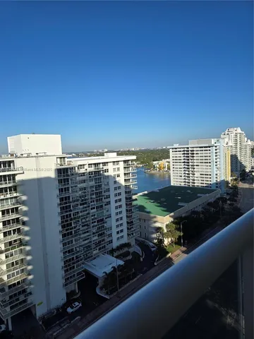 a view of a balcony with city view