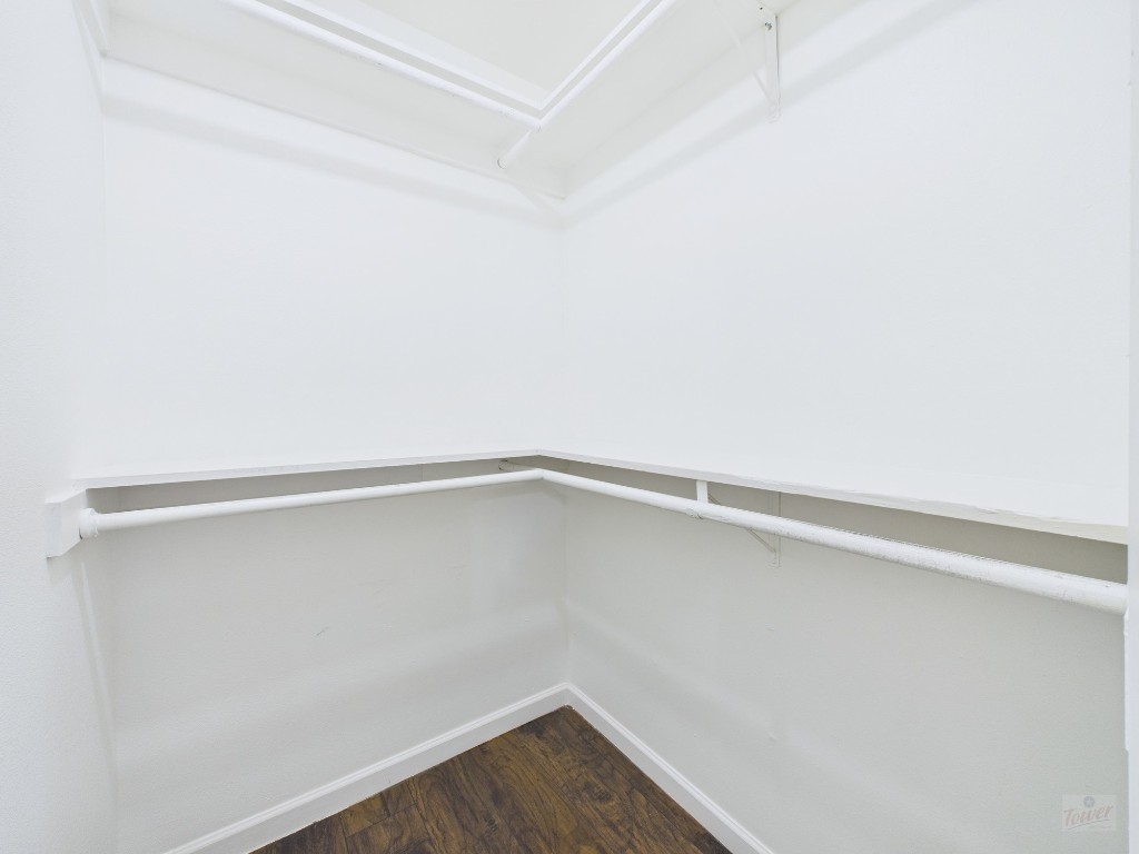 1303 Hollow Creek Drive, Unit 1 Austin, TX 78704 - Photo 11 of 19 a small space with a ceiling fan & wooden floor