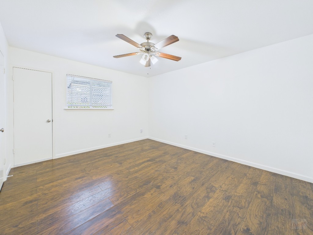 1303 Hollow Creek Drive, Unit 1 Austin, TX 78704 - Photo 12 of 19 a view of empty room with wooden floor