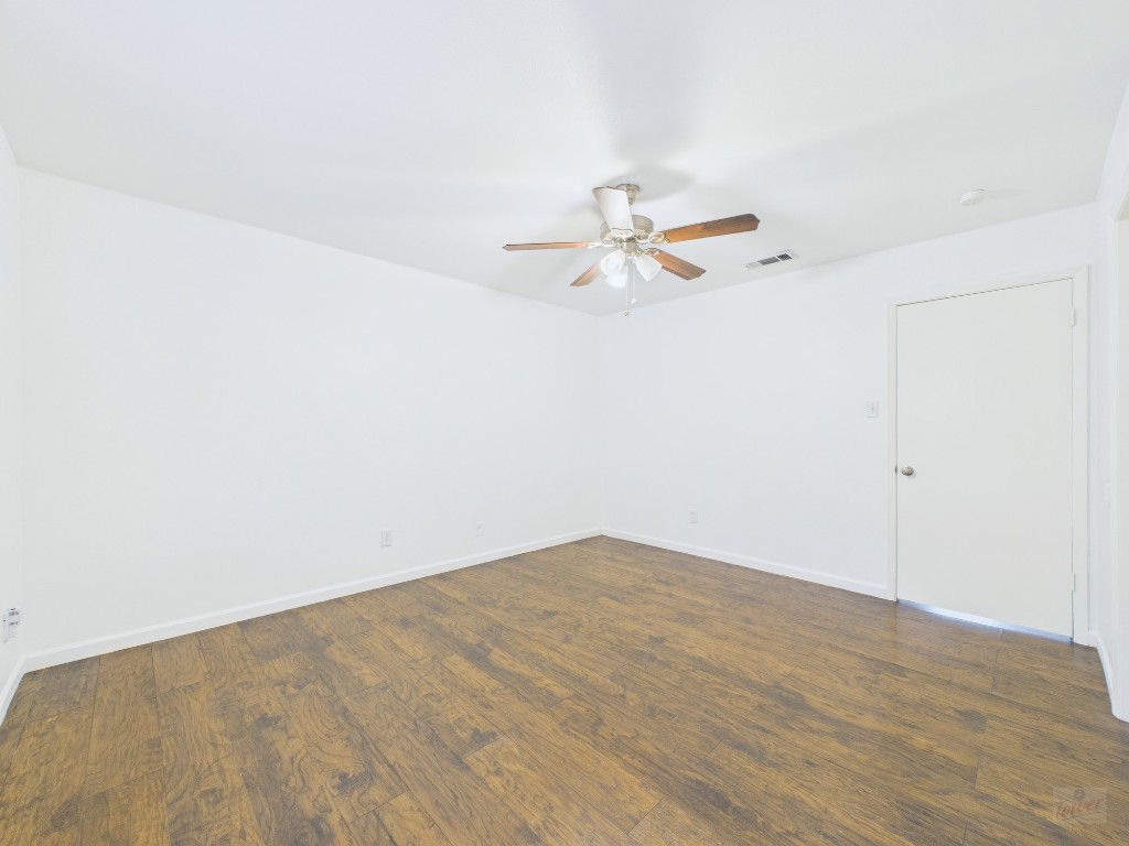 1303 Hollow Creek Drive, Unit 1 Austin, TX 78704 - Photo 15 of 19 a view of a big room with wooden floor