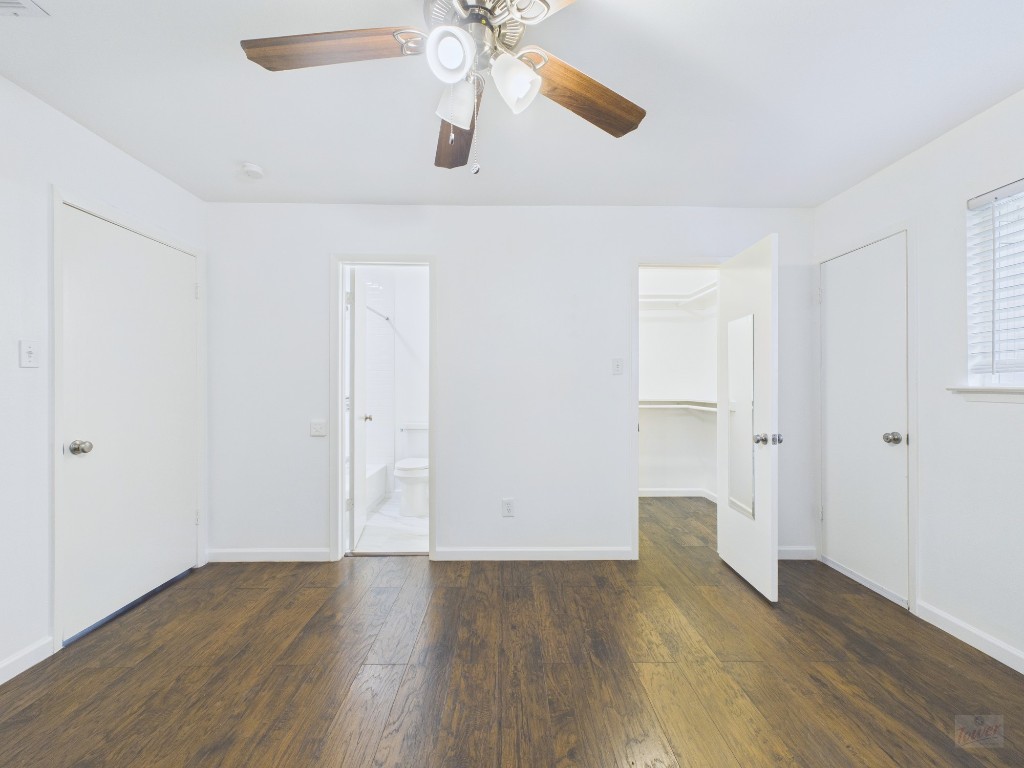 1303 Hollow Creek Drive, Unit 1 Austin, TX 78704 - Photo 16 of 19 wooden floor in an empty room