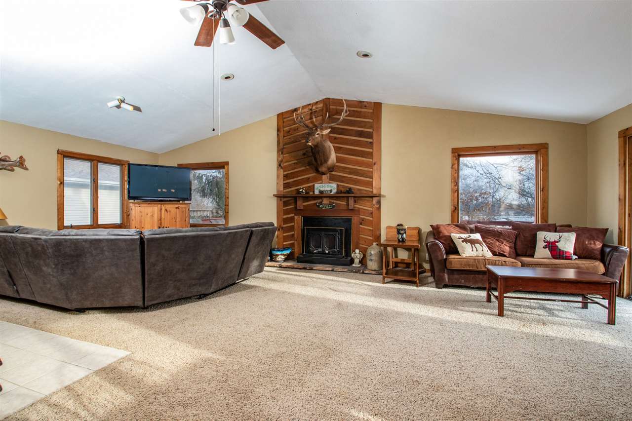 1992 Baintree Road Lake Summerset, IL 61019 - Photo 3 of 20 a living room with furniture and a fireplace