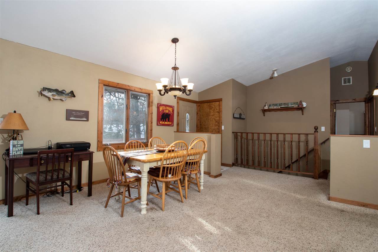 1992 Baintree Road Lake Summerset, IL 61019 - Photo 7 of 20 a view of a dining room with furniture window and wooden floor