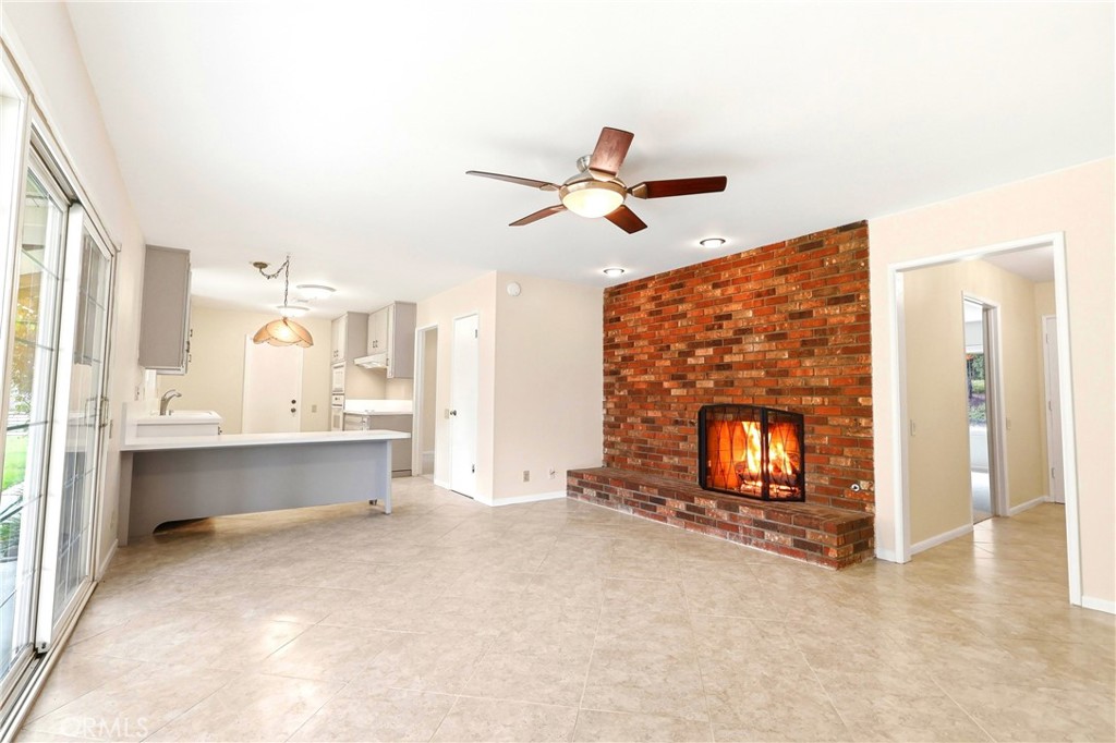2145 Fairview Avenue Riverside, CA 92506 - Photo 16 of 35 a living room with furniture and a fireplace