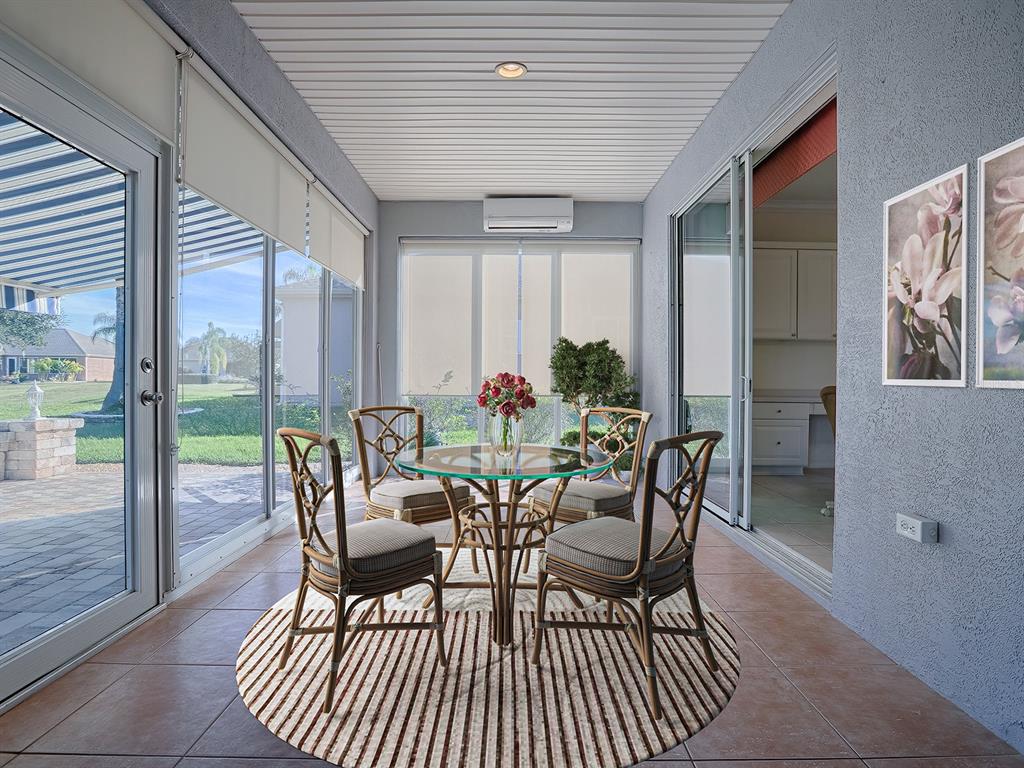 13007 Southeast 90th Court Road Summerfield, FL 34491 - Photo 33 of 78 Enclosed Lanai