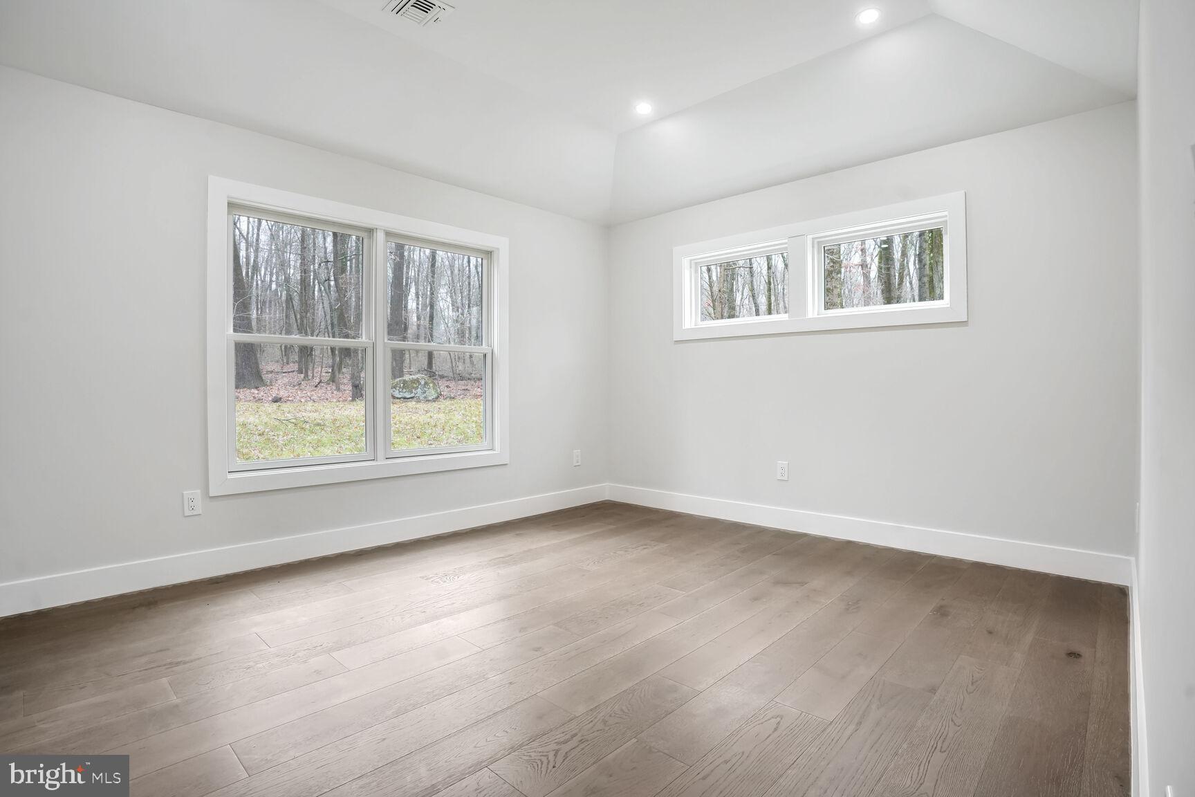 358 A Cherry Valley Road Princeton, NJ 08540 - Photo 11 of 28 a view of an empty room with windows