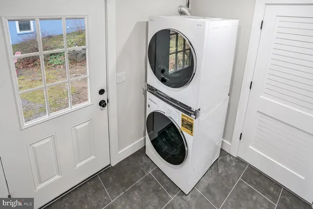 a utility room with dryer and washer